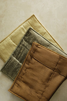 Anna Sova makes drapes and bedding from dupioni silk, a luxurious, lightweight fabric dyed with eco-safe dyes and finished with organic soap nut instead of harmful formaldehyde sizing.